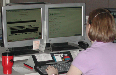 
                    A dispatcher with the Virginia State police who is no longer using 10-4 codes.
                                            (Virginia State Police)
                                        