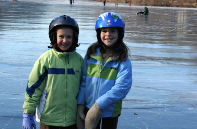 
                    Julia Lindwall and Clementine Fowle. Clementine's mother grew up on the pond and skated almost every day each winter.
                                            (Stacy Fowle)
                                        