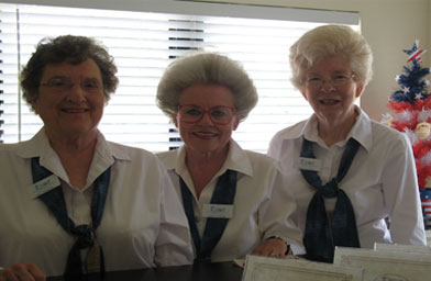 
                    Volunteer docents Ann Anderson, Gayle Dodson, and Carolyn Sowell greet visitors at the George W. Bush Childhood Home.
                                            (Katy Floyd)
                                        