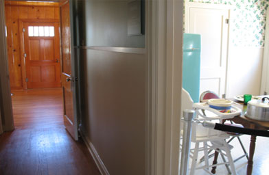 
                    A central hallway leads from the living room to the kitchen and bedrooms.
                                            (Katy Floyd)
                                        