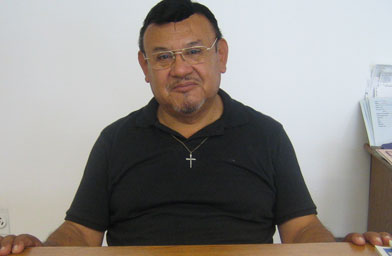 
                    Jose Adan, who owns the Buy Smart used car lot, says he is trying to organize local Latinos to become more politically active.
                                            (Kelly McEvers)
                                        