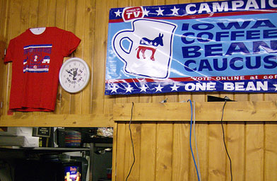 
                    A sign above the kitchen doorway advertises the "Coffee Bean Caucus": an informal and highly unscientific poll in which diners vote for their favorite candidates.
                                            (John Moe)
                                        