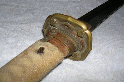 
                    The sword's has World War Two era fittings, but the blade is estimated to be from the late 1600s.
                                            (Krissy Clark)
                                        