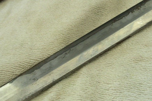 
                    There's some rust on the sword.  One expert thinks it may be blood.
                                            (Krissy Clark)
                                        