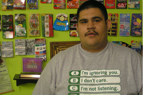 
                    Elias Pando who owns Tortilleria Lupita, a tortilla factory and convenience store, says some of his regular customers have moved to Kansas.
                                            (Scott Gurian)
                                        