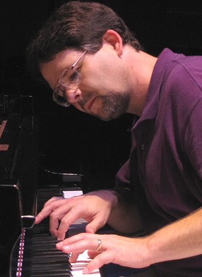 
                    Tom Rule at the piano.
                                            (Courtesy Tom Rule)
                                        