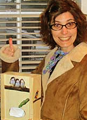 
                    Neff models presents from her younger sisters during Christmas 2006.
                                            (Courtesy Tamara Neff)
                                        