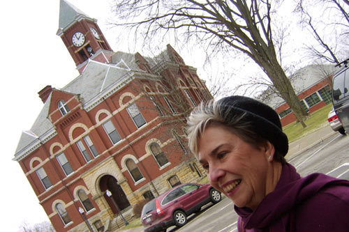 Chamber of Commerce President Pat Convery stands outside the town's restored 1889 courthouse. Convery believes that embracing diversity is not only the right thing to do, but a necessity to ensure the town's economic survival.
(Desiree Cooper)