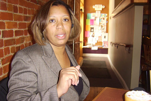 Candye Hinton takes a break from her real estate practice for a cup of coffee at Uptown Coffeehouse in Howell. Hinton is the only black realtor in Livingston County, Mich. This month, she became the first African American president of the Livingston Diversity Council.
(Desiree Cooper)