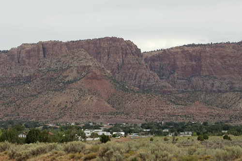 Mountains rise behind Colorado City, Ariz. Cities and states in the West are hoping the Nevada Caucus will help shine light on their issues and make presidential hopefuls pay attention to the region.
(George Frey/Getty Images)