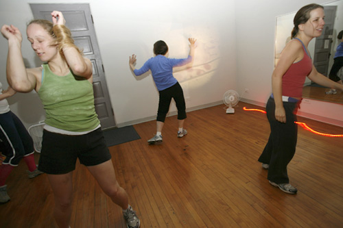 
                    Megan Krejny (left to right), Allison Wolcott and Kristen Moo get into the groove at a recent Dance Dance Party Party event in Chicago.
                                            (Jasmin Shah)
                                        