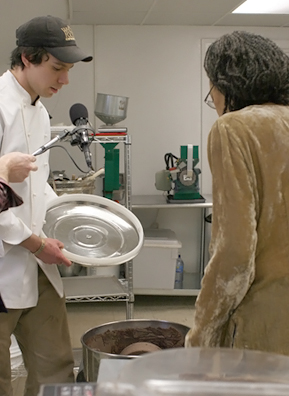 
                    Gasko explains dry conching to Weekend America host Desiree Cooper.
                                            (Josh Sarantitis)
                                        