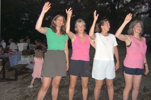 
                    The McNulty sisters demonstrate how the royals wave to their adoring subjects.
                                            (Courtesy Maureen Saxton)
                                        