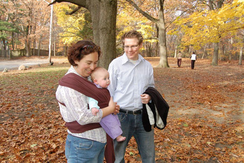 
                    Listener Caitlin Nye, her husband Christian DuComb, and their daughter, Madeleine Olivia Nye-DuComb taking a stroll. Caitlin keeps her marriage solid by remembering to "leave the gun" and "take the cannoli!"
                                            (Courtesy of Caitlin Nye)
                                        