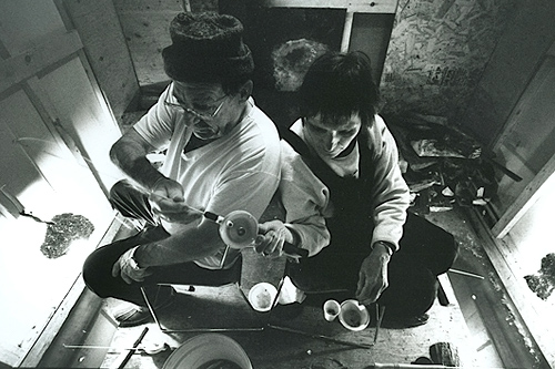 
                    A couple fishing in one of the fishing shacks owned and operated by Steve Leighton.
                                            (Sarah Breul/Salt Institute for Documentary Studies)
                                        