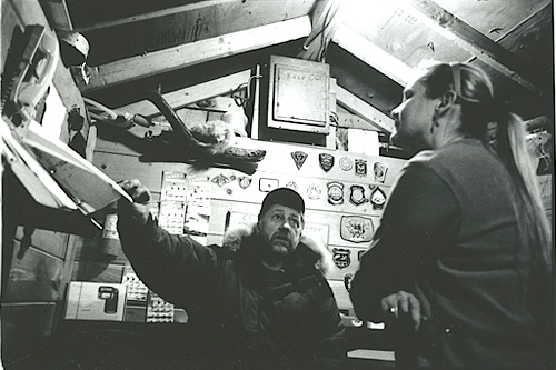 
                    Steve Leighton and his wife Marilyn in the roadside shed that serves as his office and bait shop.
                                            (Sarah Breul/Salt Institute for Documentary Studies)
                                        