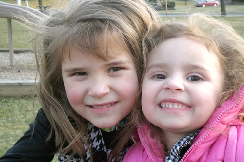 A present-day photo of the two Case Sisters. (Lillian is on the left.) Lillian turns five this month, a day after the anniversary of the start of the Iraq War.
(Courtesy Scot Case)