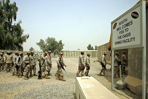 Many soldiers find life within the walls of Camp Anaconda, a huge U.S. Army base northwest of Baghdad, strangely similar to life back home.
(Liu Jin/AFP/Getty Images)