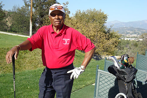 
                    Alton "Al" Duhon at the tee. Wanna make a bet?
                                            (Charlie Schroeder)
                                        