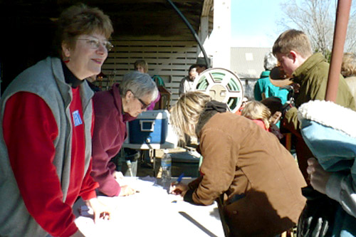 
                    The de Montille family signs in for the prairie burn.
                                            (Sylvia Gross)
                                        