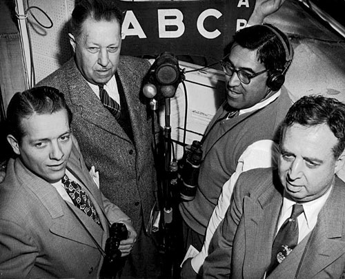 Joe Hernandez prepares to go live with his counterparts for a national ABC radio broadcast. Hernandez provided color commentary for broadcasts and then headed to the booth to call a race.
(Courtesy Caballo Press of Ann Arbor and Frank Hernandez. All rights reserved.)