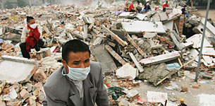 Parents wait to recover bodies of children