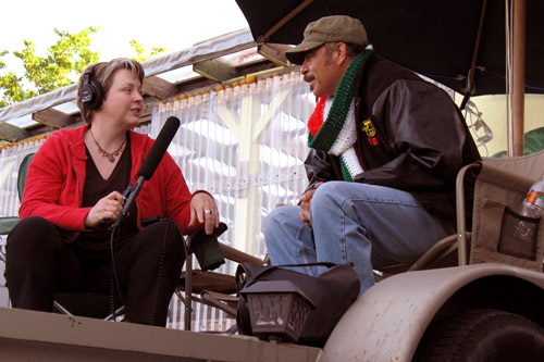Julia Barton speaks with Jose Granados at the Scarborough Faire performers' campground.
(Greg Barton)