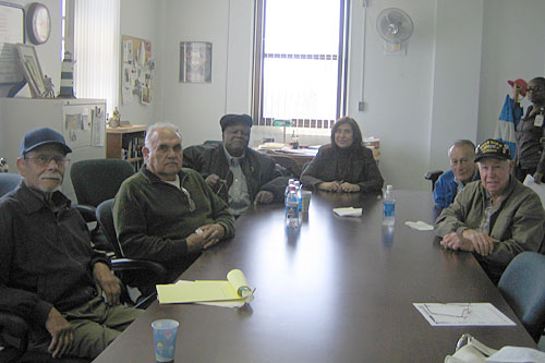 Leslie Martin, at the head of the table, is director of PTSD Outpatient Services for Los Angeles Veterans Affairs. She runs the support group for older vets with PTSD. Here she is with "her guys," as she affectionately calls them.
(Krissy Clark)
