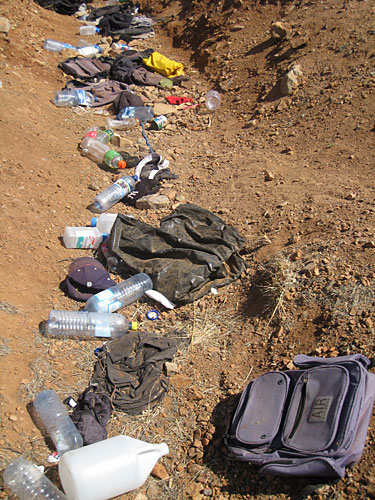 
                    "You will see around here empty bottles, clothing of all types, women's personal hygiene, deodorant, toothbrushes," retiree Don Severe says. "There's a pair of ladies underwear.  All of these bottles, they just drop as they finish.  Skin cream, pills of some sort..."
                                            (David Maxon)
                                        