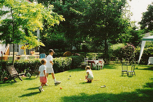 
                    Nine-year-old Henry and his sisters set up for a party in 1999.
                                            (Nanci Olesen)
                                        