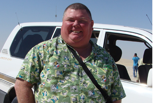 
                    Kurt Brinkley, a National Guardsman from Tennessee, is enjoying wearing civilian clothes while on R&R in Qatar. He hates his job guarding Iraqi prisoners in Camp Bucca in southern Iraq.
                                            (Orly Halpern)
                                        
