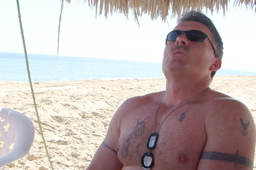 Air Force Major Brad Baxtor from Riverside, Calif., soaks up the Persian Gulf vibes on his four-day R&R pass--far from the mountains and snow in Bagram, Afghanistan. But he misses his two Harleys and hopes someone will take him to the Harley Davidson shop in Doha.
(Orly Halpern)