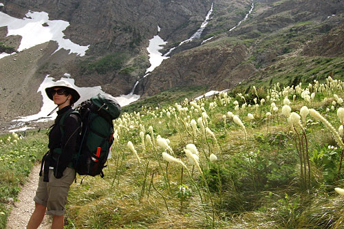 
                    Rachel descends from the Ptarmigan Tunnel pass.
                                            (Michael May)
                                        