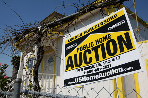 Congress is passing a bill to help homeowners facing foreclosure and to shore up struggling mortgage giants Fannie Mae and Freddie Mac. President Bush doesn't love it but he won't veto it.
(Photo by Justin Sullivan/Getty Images)