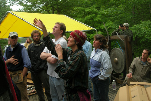 
                    Sandra Jones looks on as volunteers set the final solar tubes in place.
                                            (Shannon Mullen)
                                        