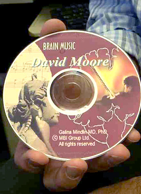 Brain Music Therapy, or BMT, is a personalized composition created using a patient's own brain waves. Pictured here is Weekend America guest Dr. David Moore's brain music CD, which he uses for sleep apnea. Patients' names are printed on each disc.
(Jim Gates)
