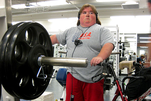 
                    Stack removes her wrist wraps and gets on the bench.
                                            (Gideon D'Arcangelo)
                                        