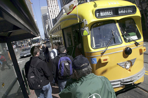 Passengers board a vintage F Market Street car bound for the San Francisco's Castro District.
(Justin Sullivan/Getty Images)