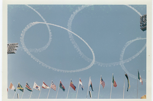 
                    Japanese sky-writers at the opening ceremonies of the 1964 Olympics in Tokyo, where Spero would compete against the formidable Russian rower Vyacheslav Ivanov for the second time.
                                            (Courtesy Don Spero)
                                        