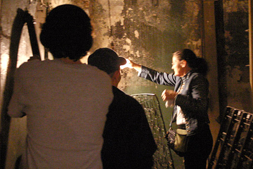 
                    Jan and Eddie showing me a back room in the bathhouse where Eddie's family washed the hotel linens.
                                            (Dominic Amorosia)
                                        