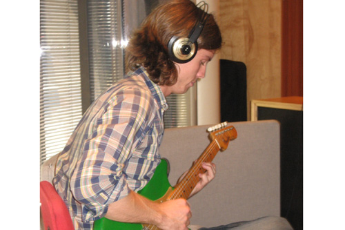 
                    Erik Hall plays both guitar and drums for NOMO.
                                            (Marc Sanchez)
                                        