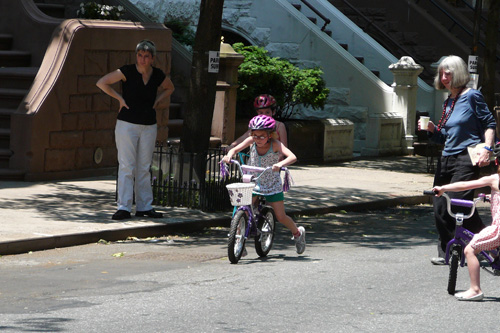
                    Fiona gamely tries to scoot and balance.
                                            (Kate Hinds)
                                        