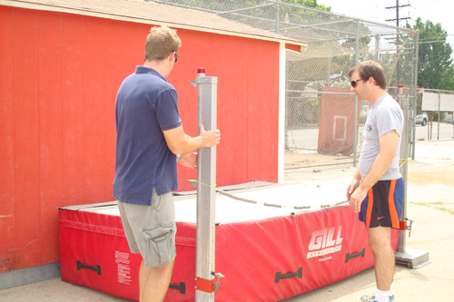 
                    Charlie and his friend, Justin Lukach, try to make sense of the high jump.
                                            (Wendy Mok)
                                        