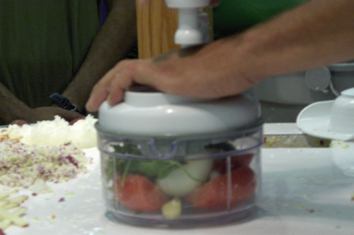 
                    Tomatoes, onions, cilantro, garlic and lime seconds before being chopped into salsa.
                                            (Marc Sanchez)
                                        