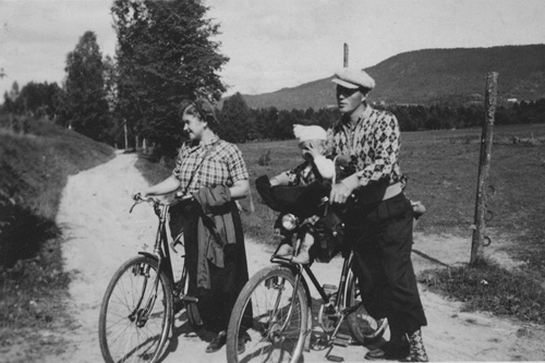 Sasha Aslanian's grandparents, Asta and Kristoffer Ladstein with their daughter Gunbjorg in the handlebar basket, photographed in 1940 on their bike ride.
(Courtesy Sasha Aslanian)