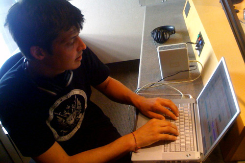 
                    Ches Smith working on the Y/OUR Town Project, which invites audio collaboration from cities on the Xiu Xiu tour.
                                            (Rob Byers)
                                        