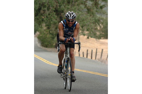
                    Bomba biking the course at the Vineman Ironman 70.3.
                                            (George Chambers, Jr.)
                                        