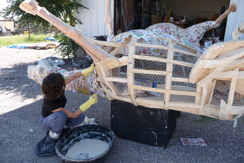 
                    Deborah Stratman in the process of papier-mache for Caballos de Vigilancia.
                                            (Rebecca Gates)
                                        