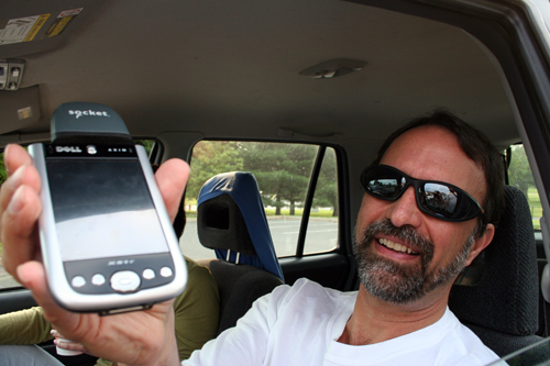
                    Seller displays his PDA with bar code scanner.
                                            (Khanh Tran)
                                        