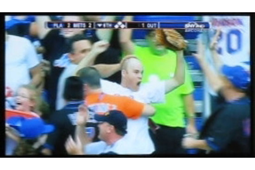 
                    A screen shot of Zack Hample "freaking out" seconds after catching the last home run ever hit by a Met at Shea Stadium.
                                            (Courtesy Zack Hample)
                                        
